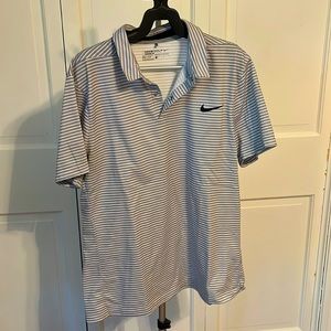 Men’s Nike golf polo size large. Gray stripe
